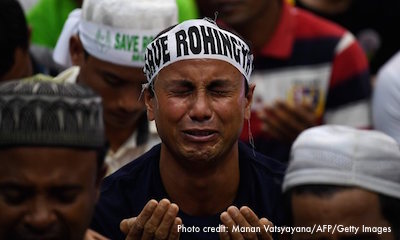 Rohingya refugee breaks down during protest.