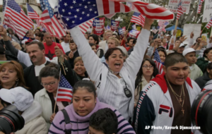 Immigration rights demonstrators rally in downtown Los Angeles 11 years ago.