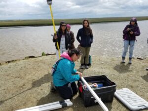 A group of Chevak villagers participate in an erosion monitoring training hosted by the Alaska Institute for Justice