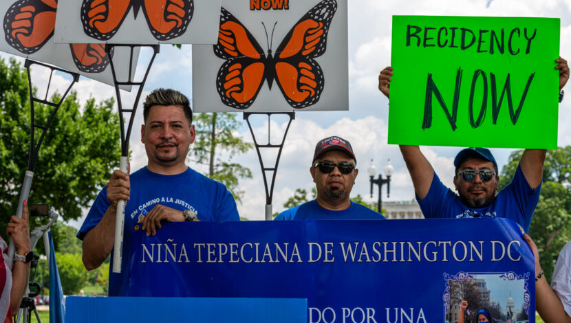 A group of people at a TPS demonstration in Washington DC