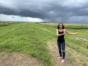 Chief Shirell Parfait-Dardar stands on a levee in Chauvin, Louisiana
