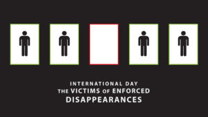 A group of people standing in boxes above "International Day of the Victims of Enforced Disappearances"