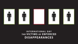 A group of people standing in boxes above "International Day of the Victims of Enforced Disappearances"
