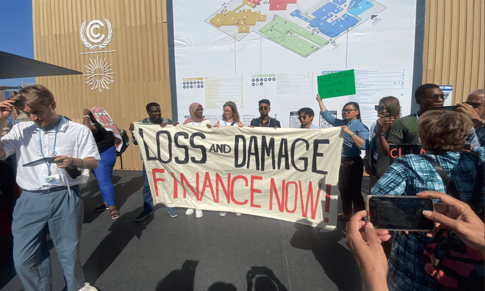 Loss and Damage Youth Collaboration raising awareness for L&D funds at COP27