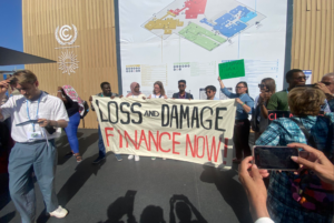 Loss and Damage Youth Collaboration raising awareness for L&D funds at COP27