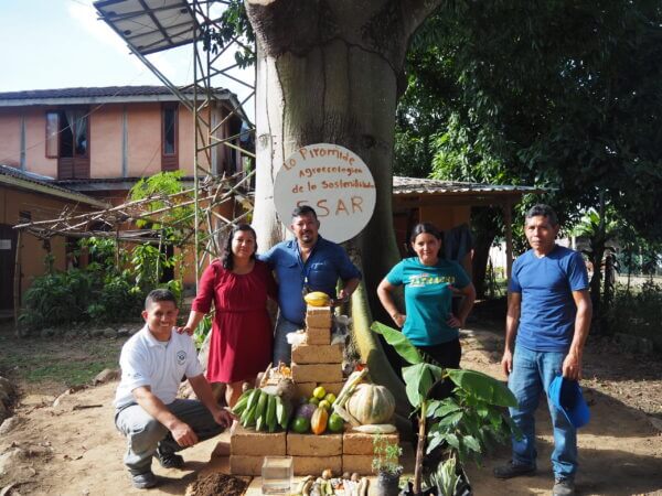 Fundación San Alonso Rodríguez (FSAR) standing in front of exhibition