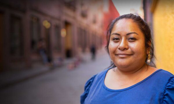 Hispanic woman smiling at the viewer