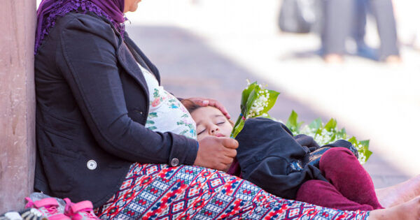 Woman and child in a Street of Strasbourg