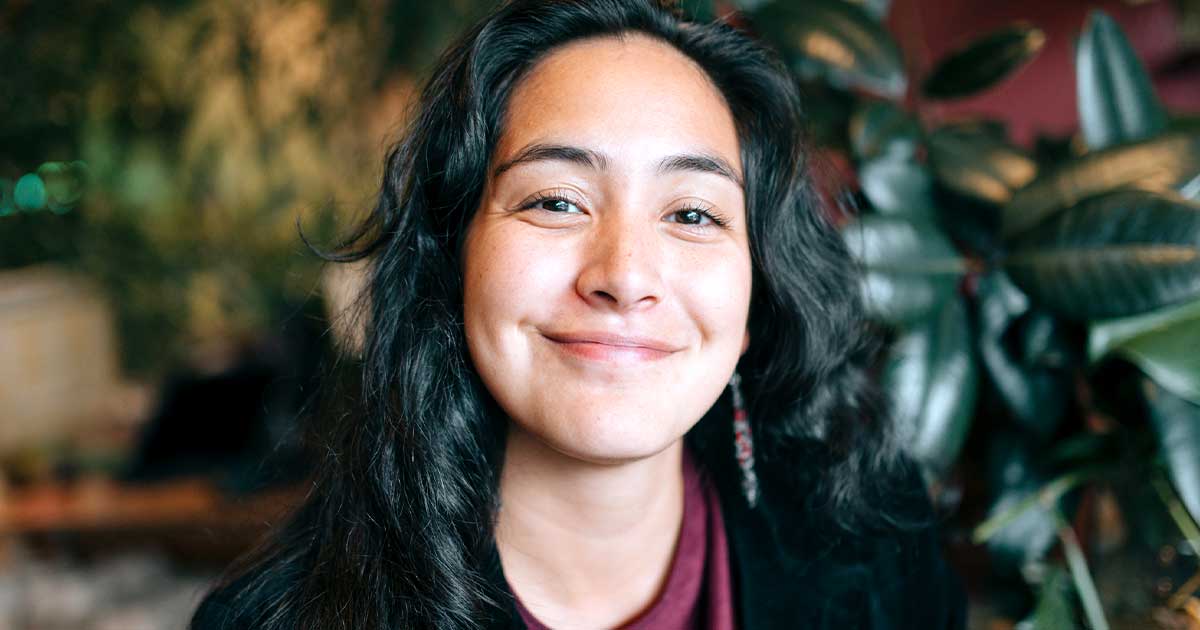 Young woman smiling at the viewer