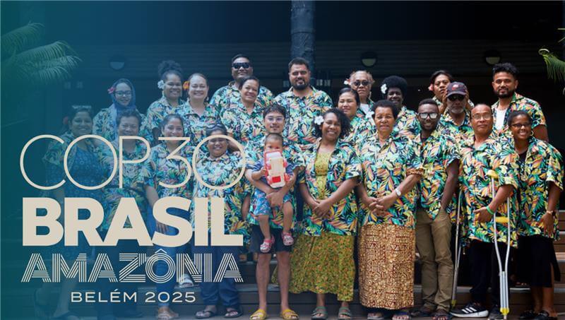 A diverse group of Pacific Rising attendees wearing matching tropical shirts posing happily together. Text on the left reads "COP30 Brasil Amazônia Belém 2025".