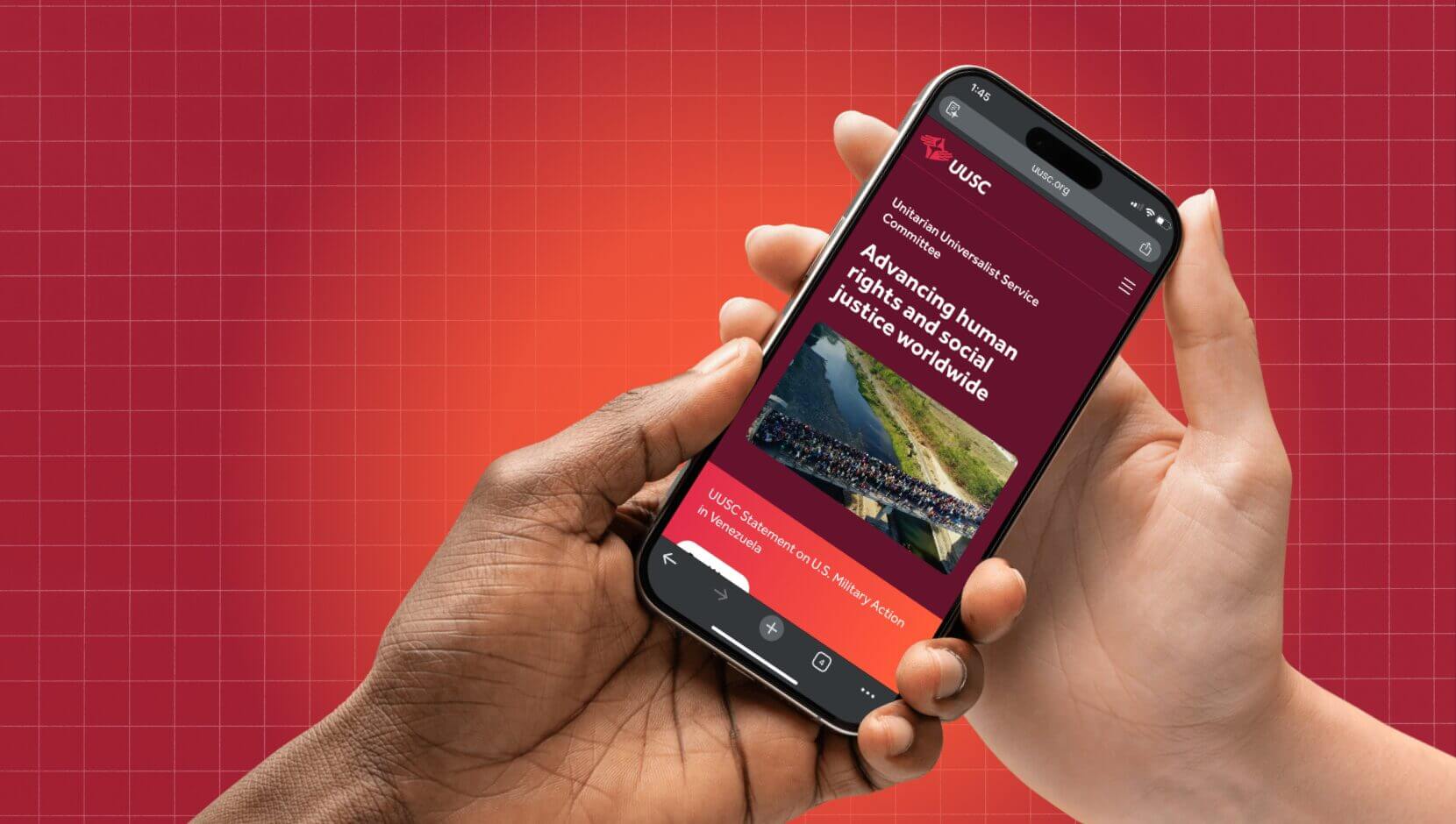 hands holding phone that showcase new UUSC website